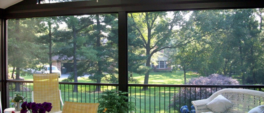 Enclosed Interior Deck Living Space - warm ambiance, gorgeous design by Heartlands Home Building Company, Chesterfield Missouri