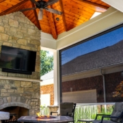 beautiful fireplace, ceiling and retractable screen