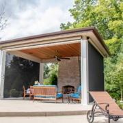 outdoor room with retractable solar screen room system