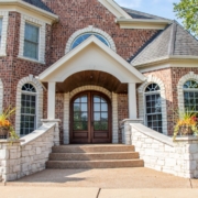 grand front entrance that helps boost homes value and curb appeal