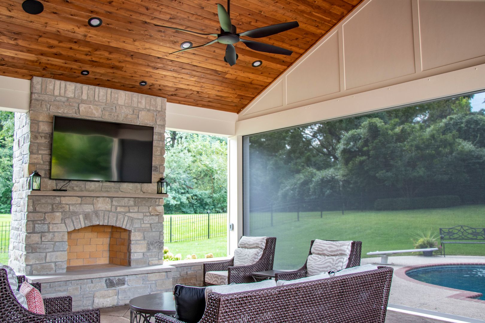 retractable screen wall on a pool house