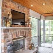 gorgeous fireplace feature in an outdoor room