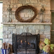 fireplace feature in an outdoor room