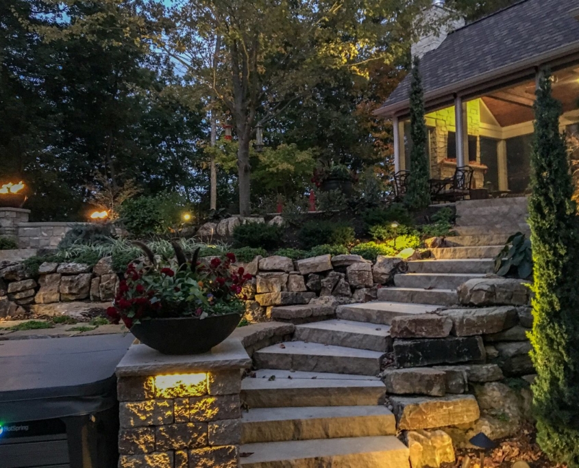 Outdoor space with custom steps leading to an outdoor room