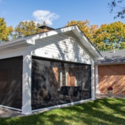 A room addition with three retractable screen walls