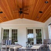 An outdoor room addition with a custom wood ceiling
