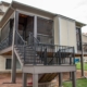 Outdoor screen room deck with a dog door