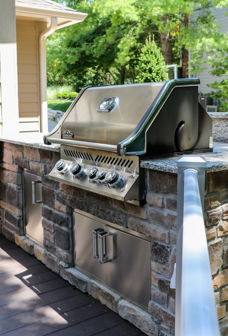 cook and serve your guests without missing the fun with an outdoor room grill