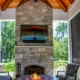 Fireplace with retractable screens that help provide warmth during the cooler seasons