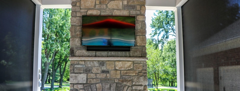 Fireplace with retractable screens that help provide warmth during the cooler seasons