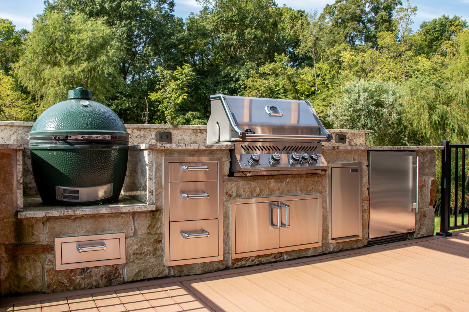 A grilling and beverage center located on a patio for convenience