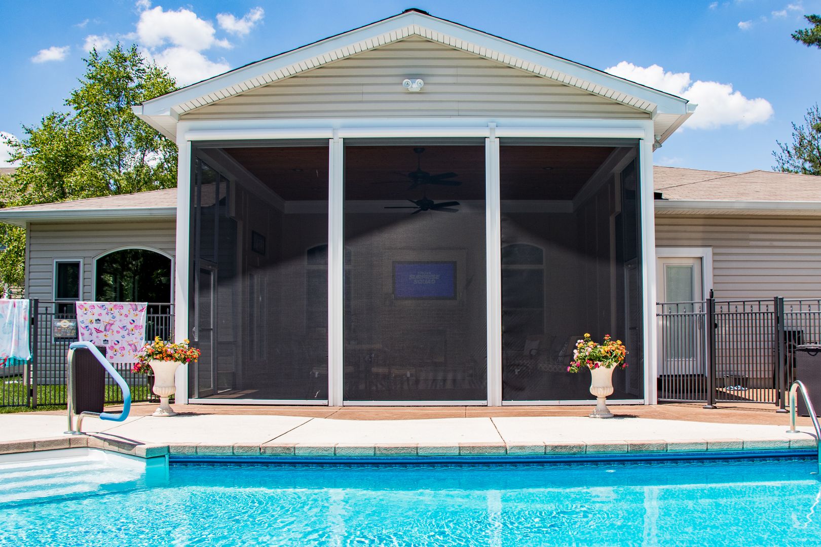 retractable screens on a room addition