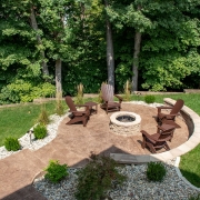 decorative concrete patio with fire pit