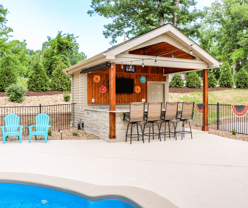 after photo of a private pool and pool house oasis