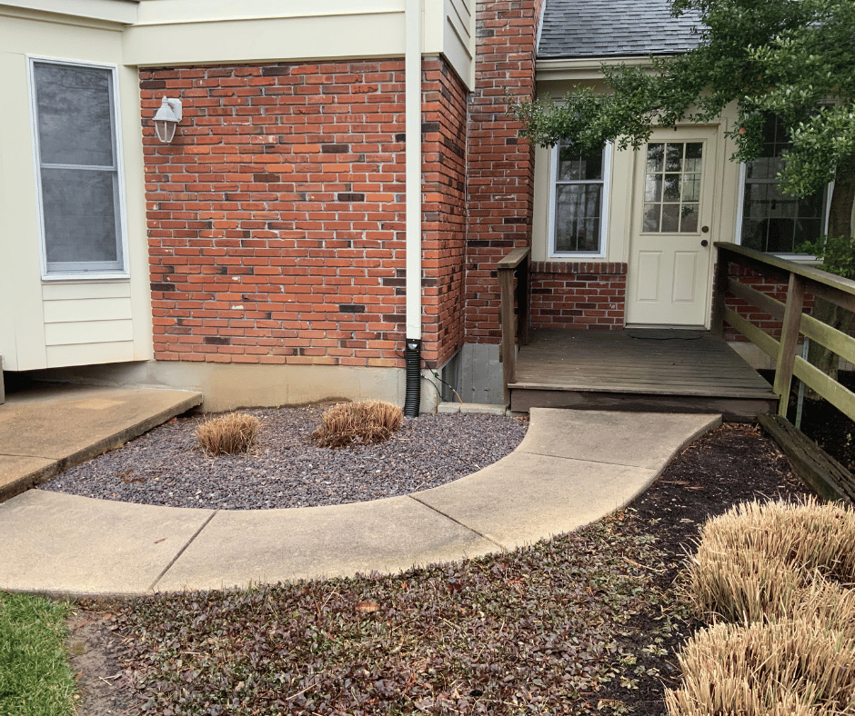 before photo of the custom screen room system with a concrete patio