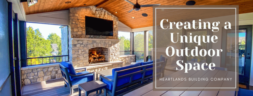 A unique outdoor space with vaulted ceilings, a gas fireplace, screen room, and open deck area.